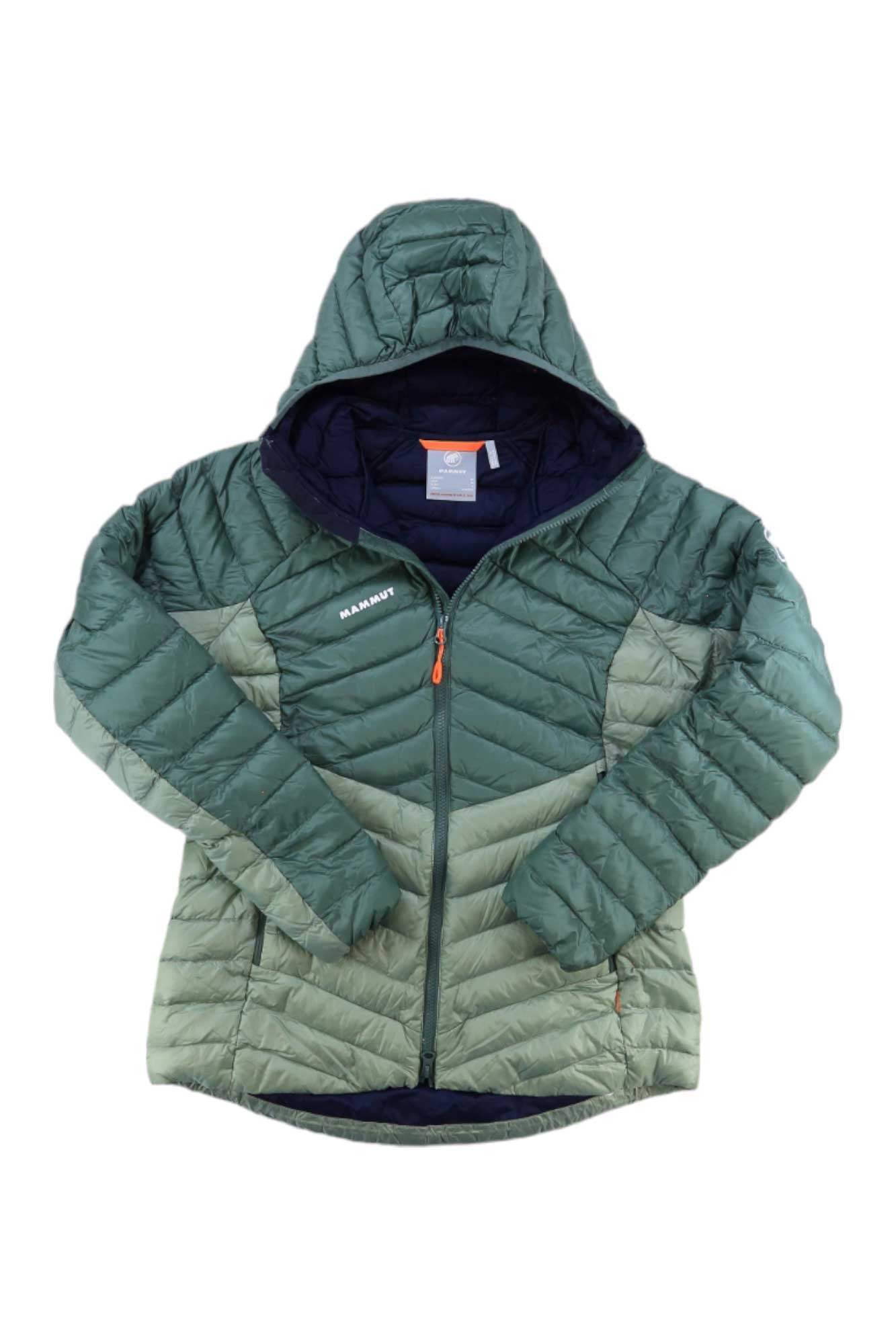 The Mammut Womens Broad Peak IN Hooded Jacket is a green, quilted, hooded down jacket with a front zipper, long sleeves, and a small left-chest logo. It's insulated and lightweight—ideal for extra warmth.