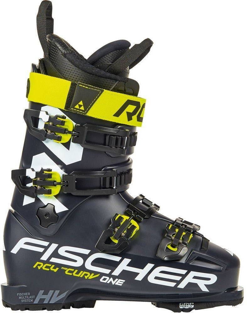 The Fischer RC4 The Curv One 110 Vacuum Walk is a black and yellow downhill ski boot featuring four buckles, bold white branding, and Vacuum Walk technology for outstanding alpine skiing performance.