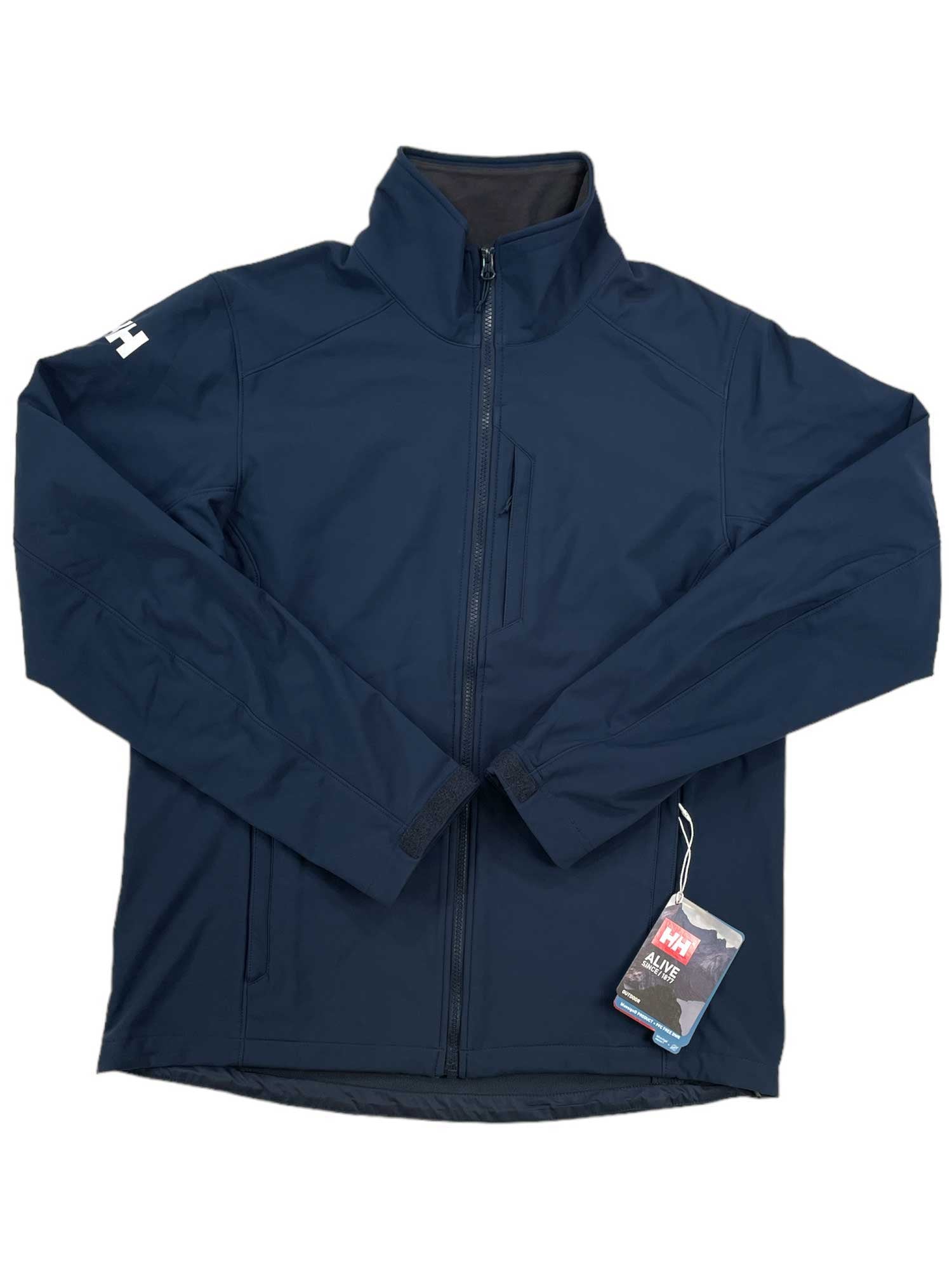 The Helly Hansen Mens Paramount Softshell Jacket is a navy blue water-resistant hiking jacket featuring a high collar, front zipper, long sleeves, an attached tag, and the Helly Hansen logo on the left shoulder.