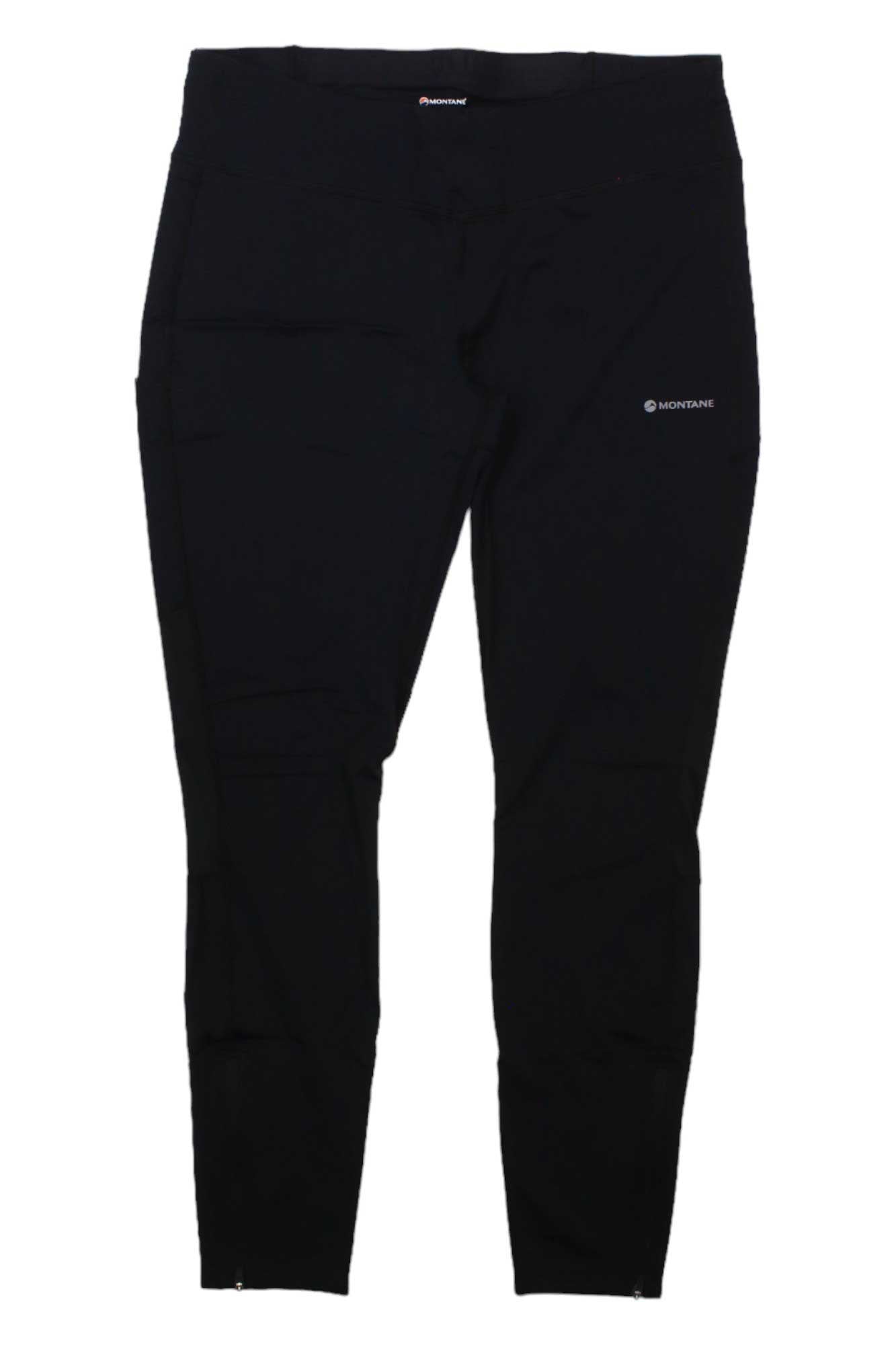 The Montane Womens Slipstream Trail Tight - Reg Leg is shown in black, laid flat on a white background. These slim-fit hiking leggings with the Montane logo on the left thigh are ideal for outdoor adventures or daily wear.