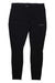 The Montane Womens Slipstream Trail Tight - Reg Leg is shown in black, laid flat on a white background. These slim-fit hiking leggings with the Montane logo on the left thigh are ideal for outdoor adventures or daily wear.