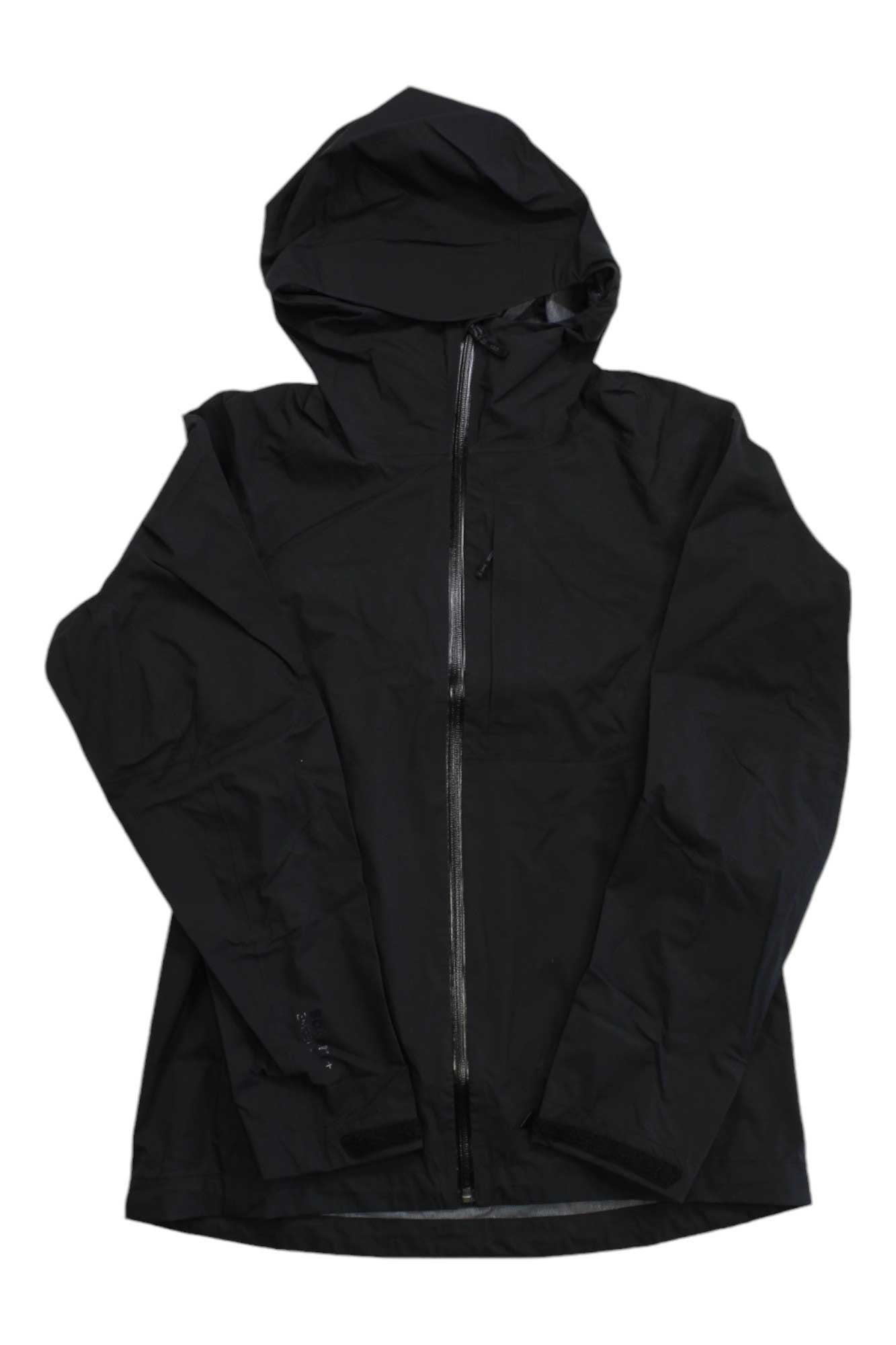 The Black Diamond Womens Highline Stretch Shell Jacket is a black, minimalist, hooded jacket with a front zipper and long sleeves. It features PFC-free DWR water resistance and is shown flat on a white background.