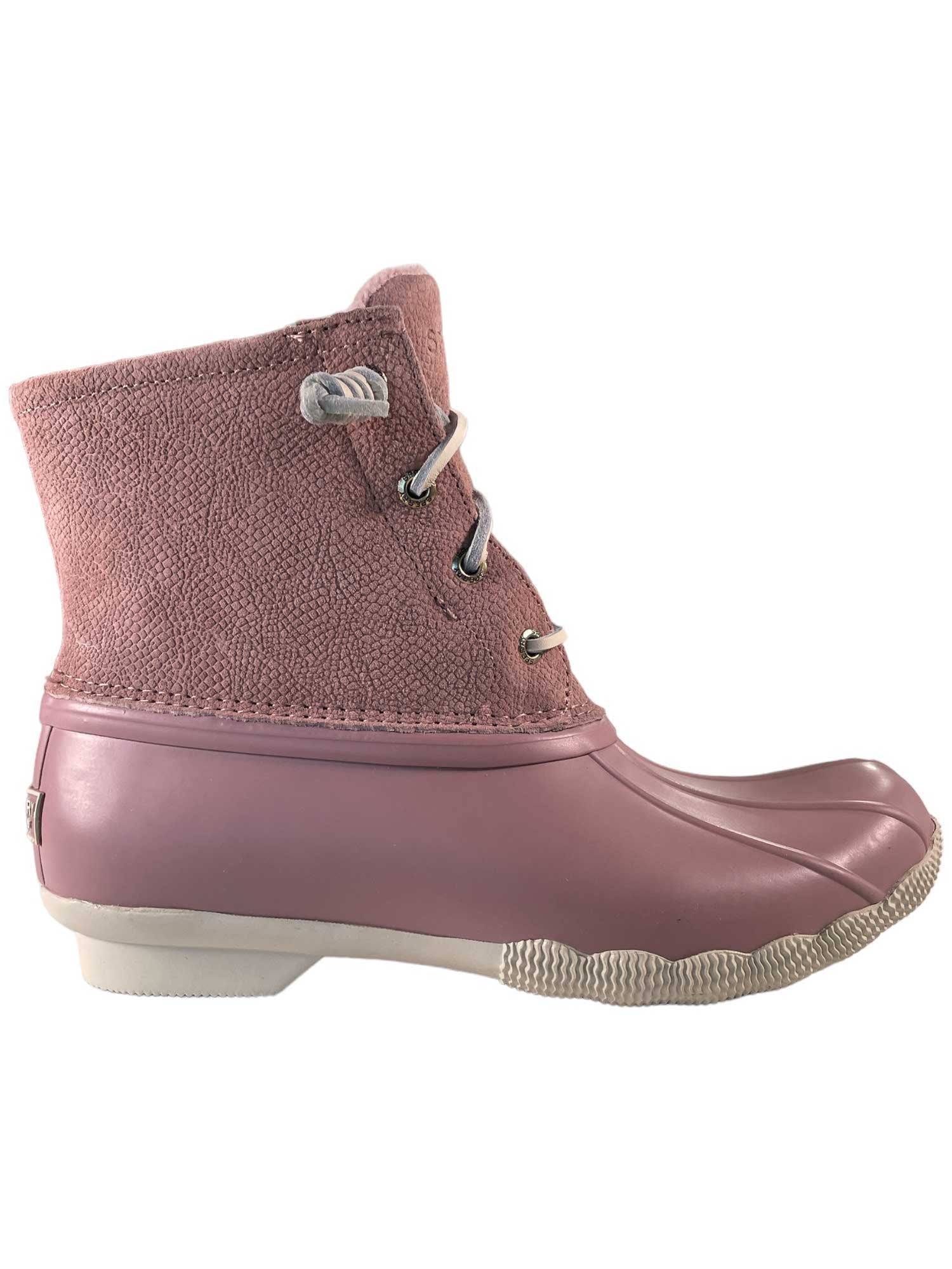 The Sperry Women's Saltwater Boot in mauve features a textured fabric upper, rubber lower section, white laces, and a white sole, shown from the side.