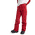 A person in bright red Burton Women's Society Pant, made with DRYRIDE stretch fabric, paired with black snow boots and a white long-sleeve shirt, stands with one hand in their pocket against a plain white background.