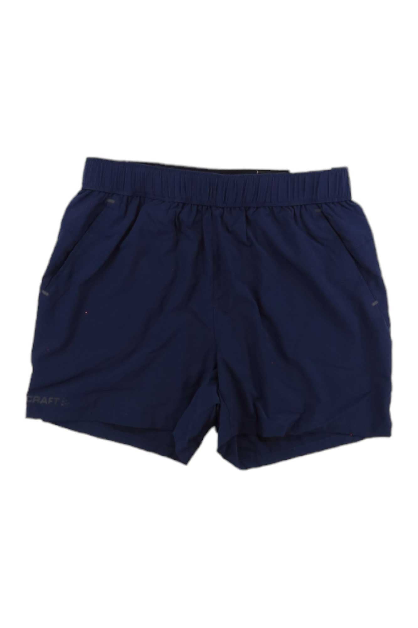 Craft Sportswear Mens ADV Essence 2-In-1 Stretch Short in navy blue, featuring an elastic waistband and side pockets. Made from moisture-wicking recycled materials, the shorts are shown laid flat on a white background.