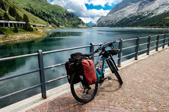 bicycle next to a scenic lake