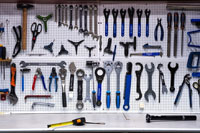 bike tools hanging on a wall