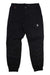 The Mammut Men's Massone Light Pant in black features an elastic waistband and cuffs, button closure, side pockets, and a small logo patch on the left thigh.