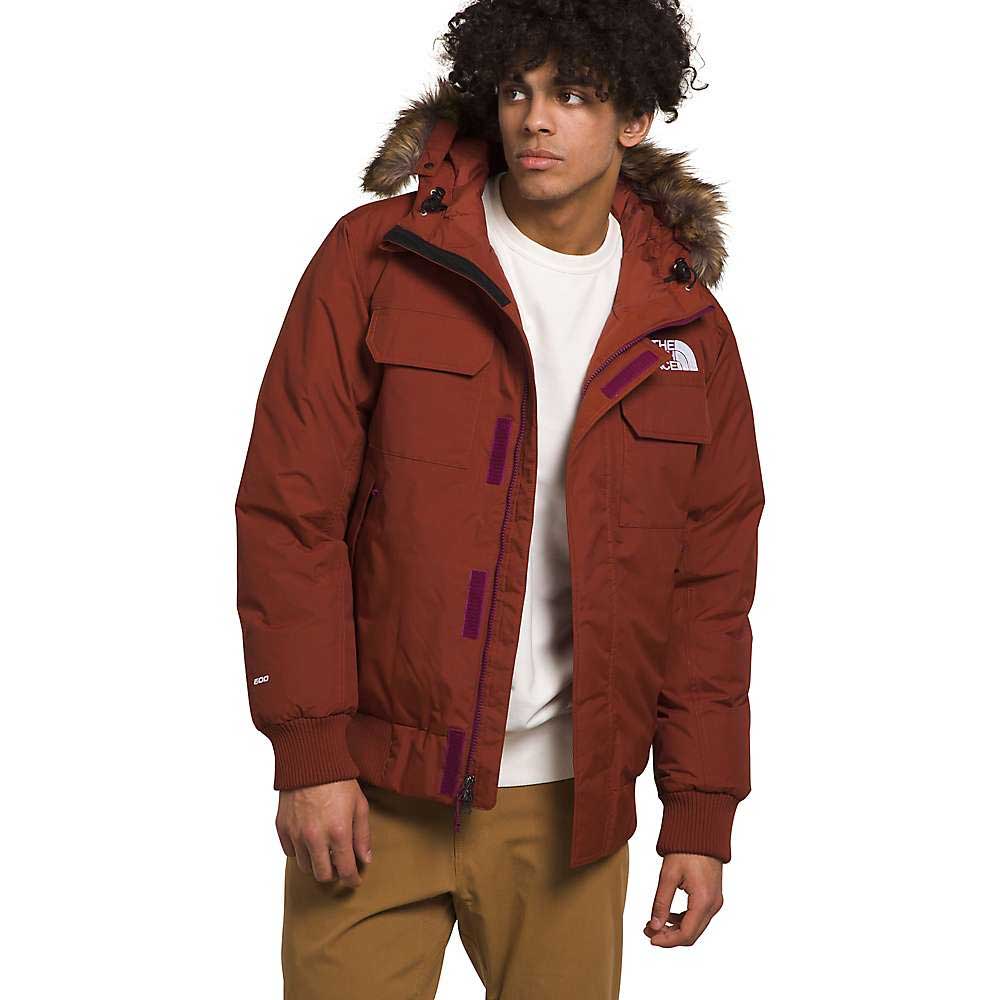 Men's bomber jacket in dark rust brown with faux-fur trimmed hood and ribbed hem cuffs