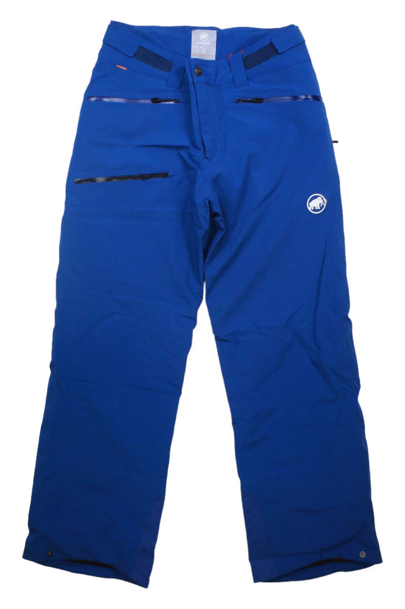 The Mammut Mens Stoney HS Thermo Pant in bright blue features multiple zippered pockets, an adjustable waistband, reinforced cuffs, and a small white circular logo on the left thigh. The pants are laid flat on a white background.