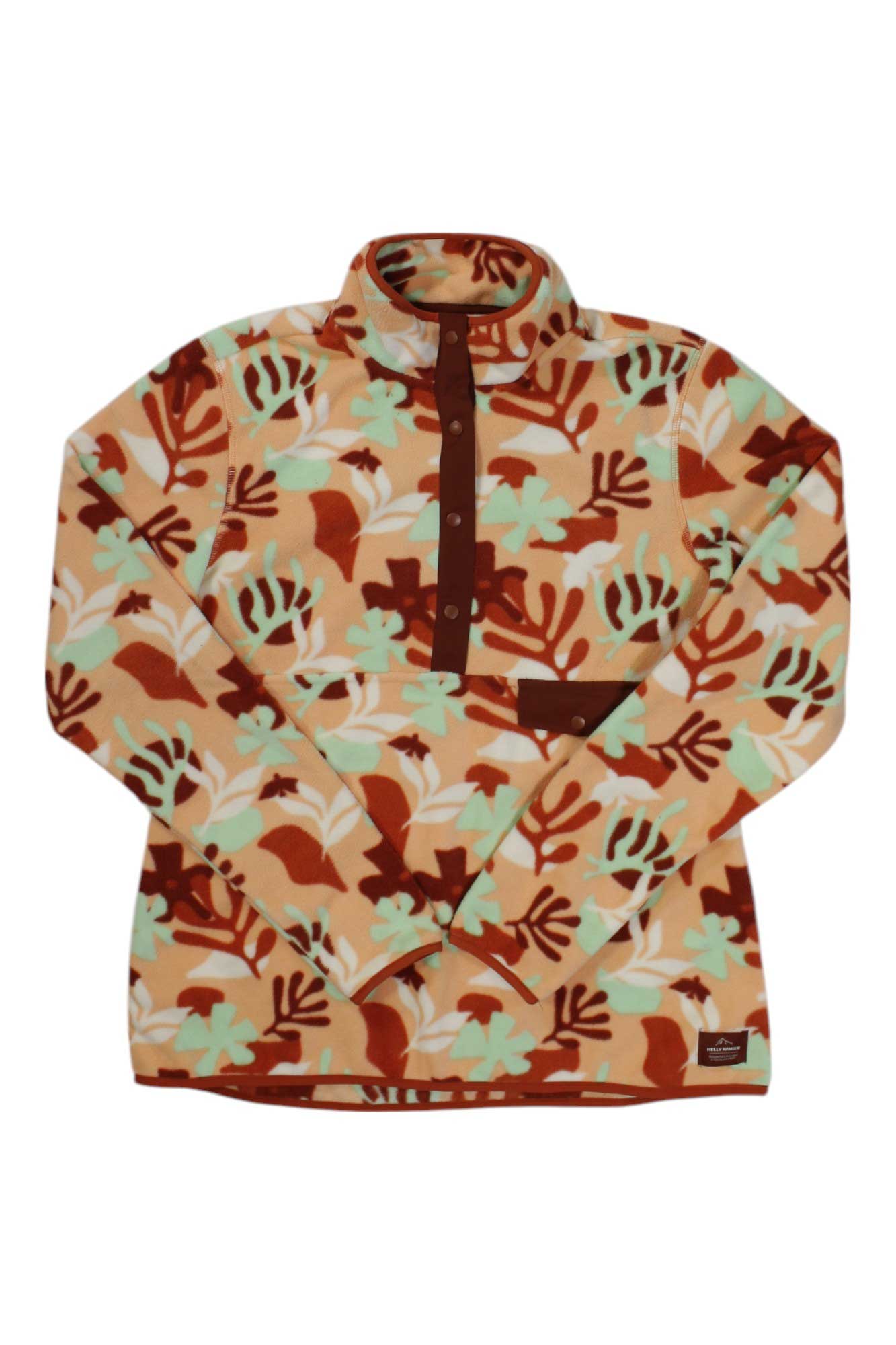 The Helly Hansen Womens Maridalen Fleece Top features a high collar, snap buttons, an abstract leaf pattern in brown, white, green, and orange, a small front pocket, and a patch on the lower hem.