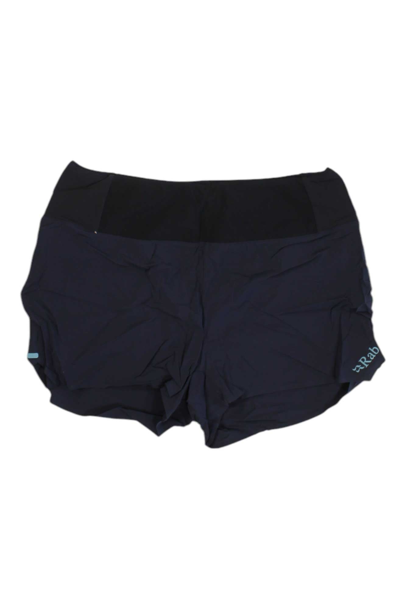 The Rab Womens Talus Trail Light 5 Inch Short is a fitted black trail short for women, featuring a wide waistband, small lower-left logo, lightweight quick-drying material, and designed for comfort on any outdoor adventure.