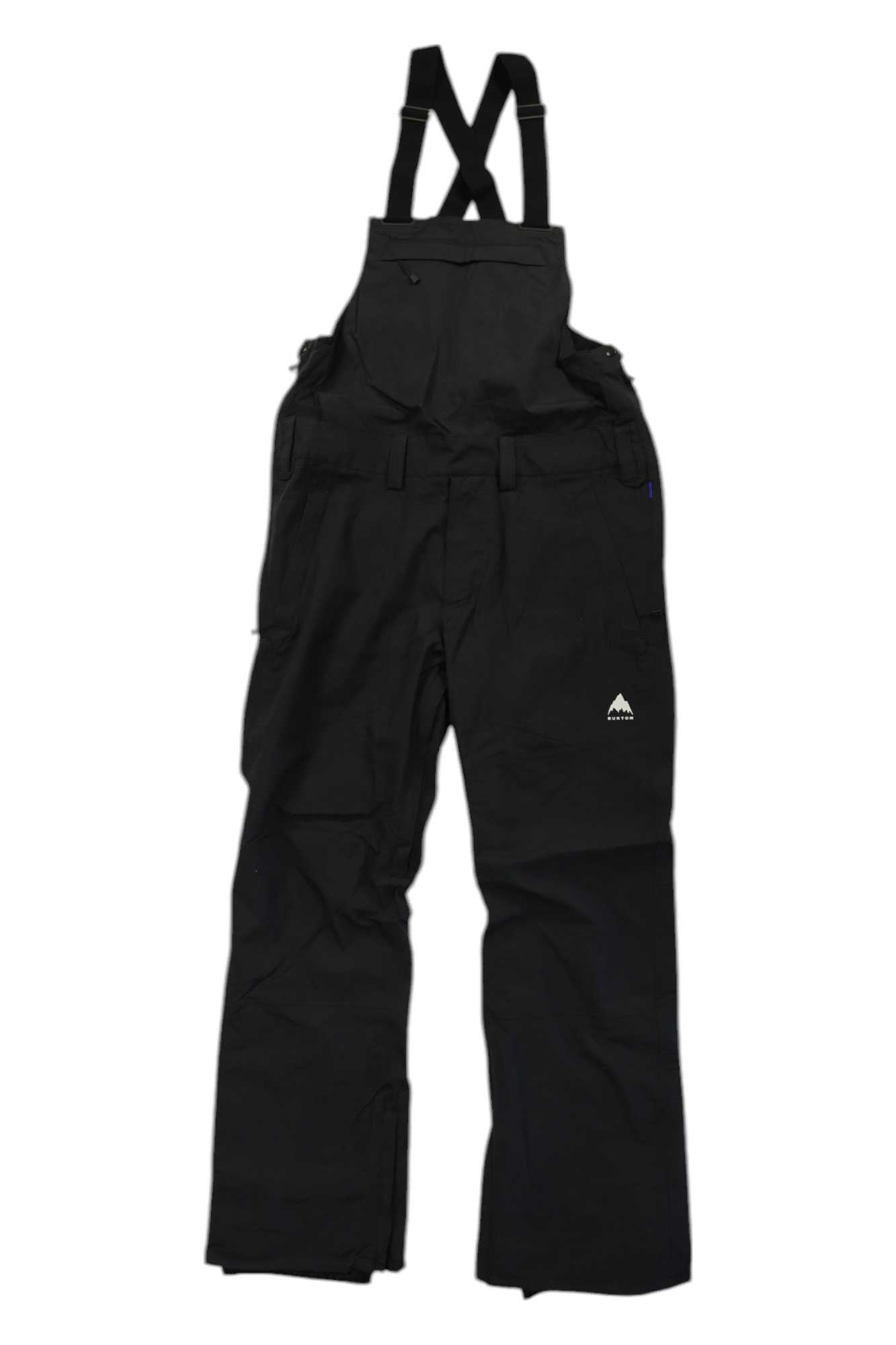 The Burton Mens Snowdial 2L Bib Pant is shown laid flat on a white background. These black waterproof snowboard bib pants feature adjustable shoulder straps, a front chest pocket, side pockets, and a small white mountain logo on the upper right thigh.