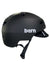 The Bern Brentwood 2.0 Helmet - Bike is a matte black urban helmet with a visor, adjustable chin strap, and visible white Bern logo. Shown from the side, it offers all-season style and safety for every ride.