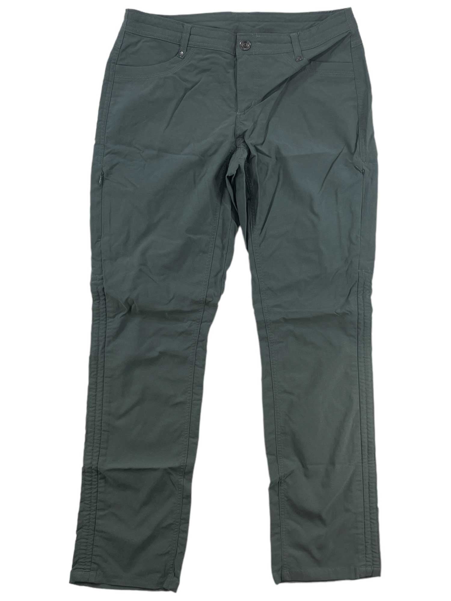 A pair of dark green Womens Trekr Pants, featuring a straight-leg cut, button-zipper closure, front pockets, and UPF 50 sun protection, great for hiking—shown lying flat on a white background.