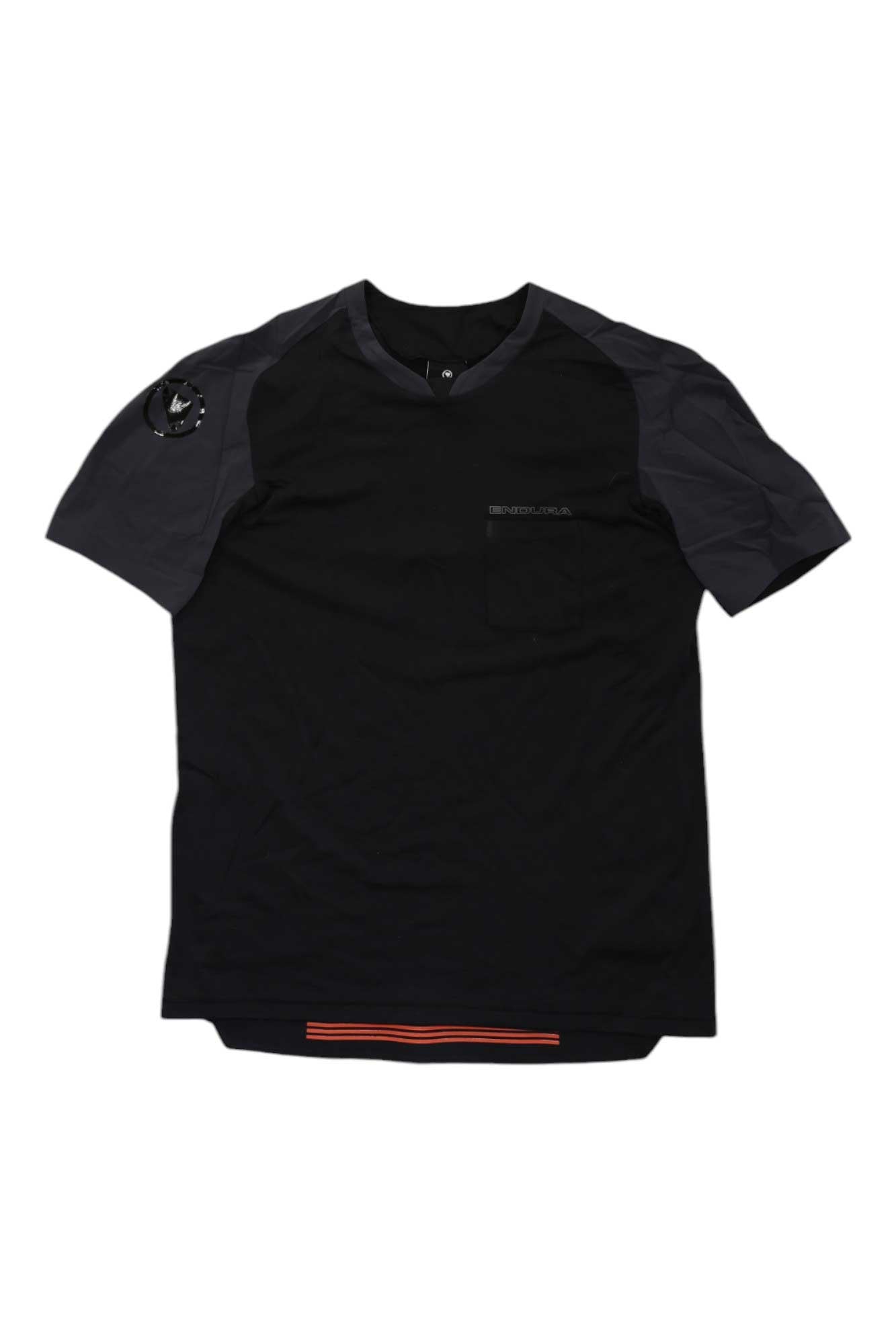The Endura Mens GV500 Foyle Top is a black short-sleeve T-shirt with dark gray details, bike-ready fit, small left chest logo, round sleeve patch, and red-orange striped hem. It features moisture-wicking fabric for comfort on the move.