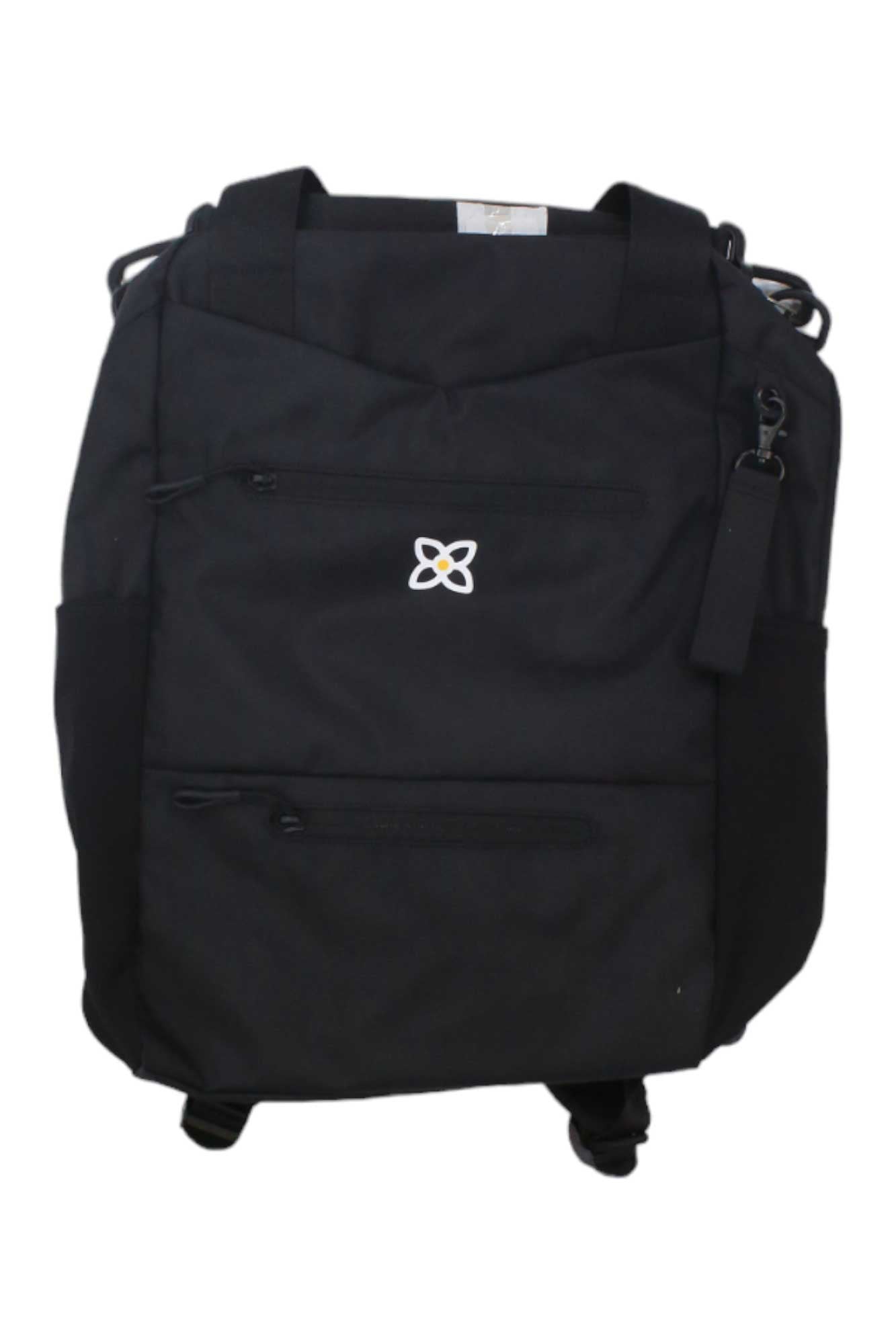 The Sherpani Womens Camden Backpack is a black, vegan, recycled backpack with a white floral logo, two zippered and two side pockets, plus laptop space—ideal for stylish travel.