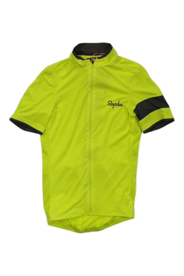 The Rapha Mens Super Lightweight Jersey is a bright yellow short-sleeve cycling top featuring a front zipper, black collar lining, and a black stripe on the left sleeve. "Rapha" is embroidered on the chest.