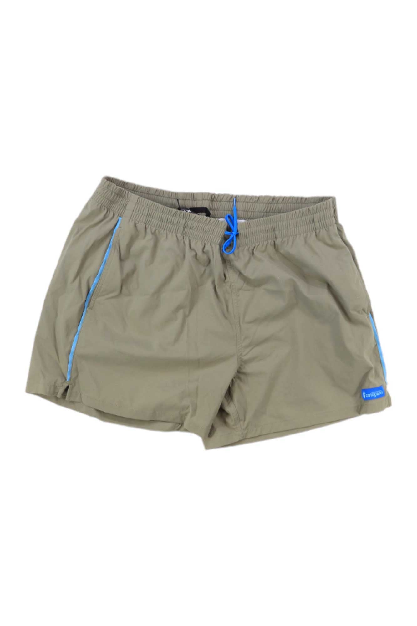 A pair of light olive green Cotopaxi Men's Brinco Shorts with elastic waistband, blue drawstring, side pockets with blue trim, and a small branded tag—perfect for bouldering, swimming, or surfing.