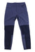 The Kari Traa Women's Thale Hiking Pant, featuring blue and navy colorblock design, front pockets, button closure, and reinforced knee panels, is laid flat on a white background.