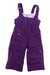 A pair of purple Obermeyer Girls Snoverall Pant insulated ski pants with adjustable straps, a front zipper, and side pockets is shown on a white background.
