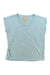 The Indyeva Womens Sofi Top is a light blue short-sleeve V-neck shirt with a beige neckline tag and small embroidered logo near the hem, offering sun protection and comfort for hiking or outdoor adventures.