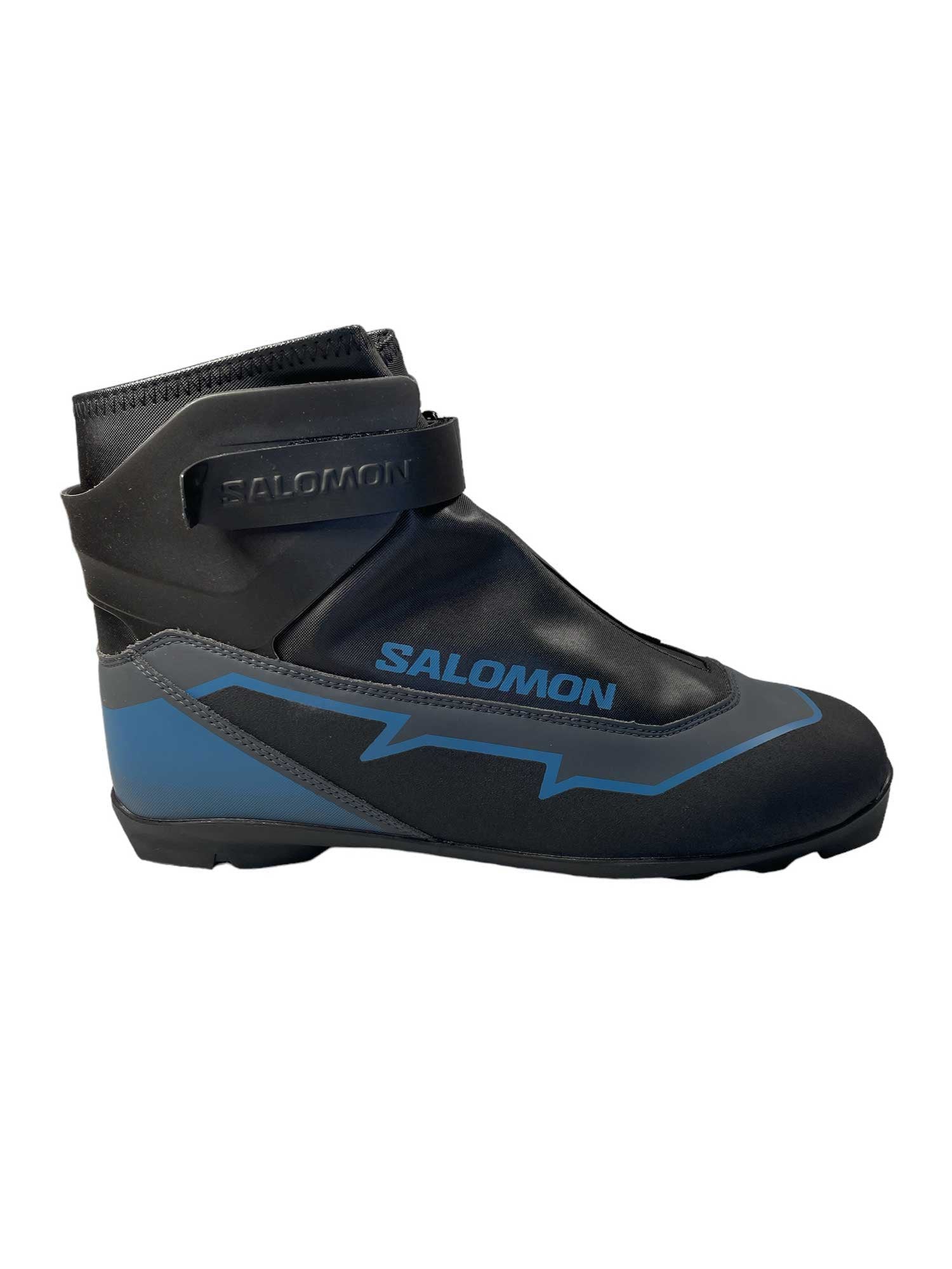 Black ski boot with blue side panels, Salomon logo, and Velcro cuff strap