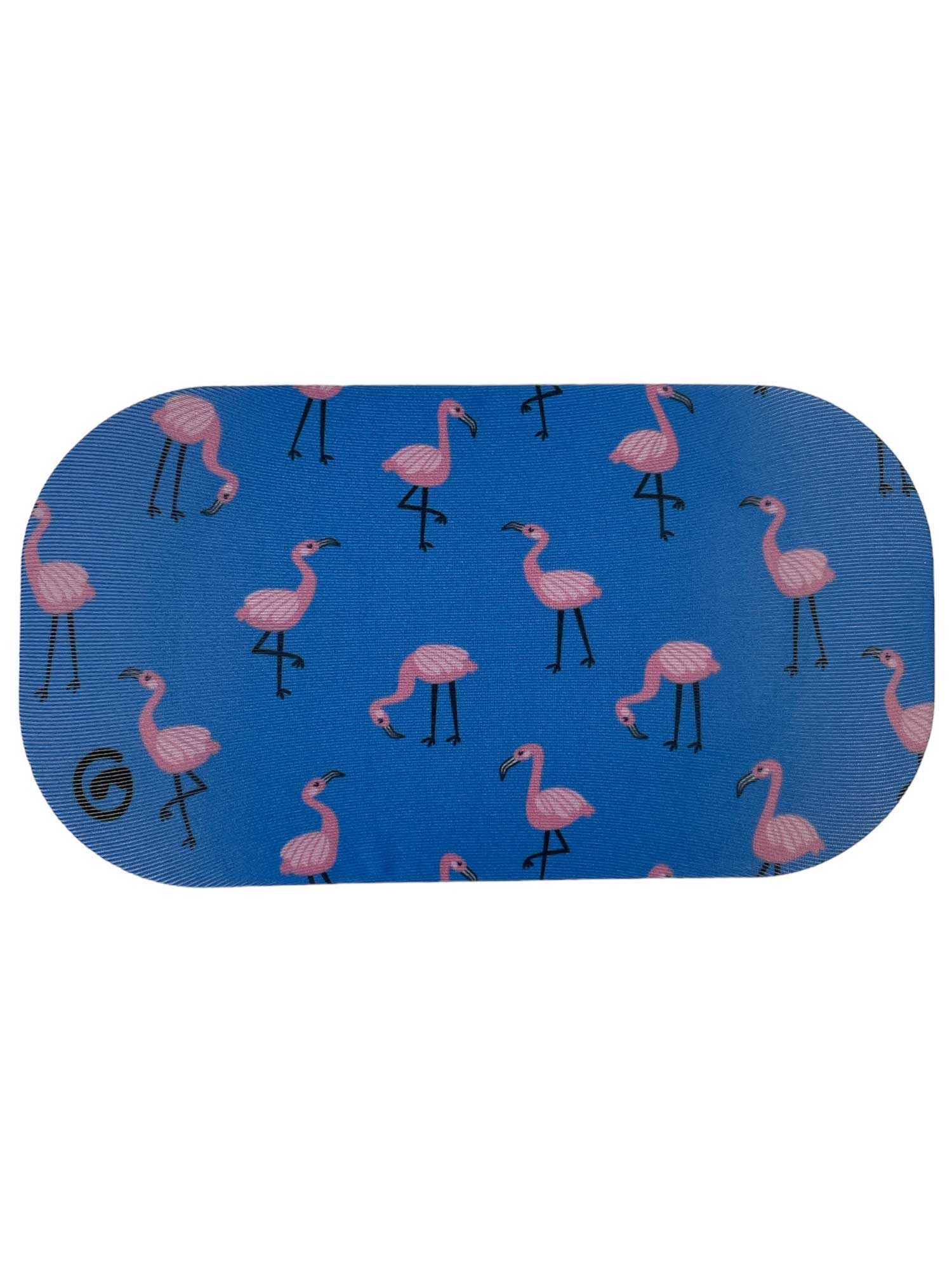 The GoggleSoc Protective Goggle Cover is an eco-friendly, blue rectangular patch with rounded corners, featuring a repeating pattern of pink flamingos in various poses—perfect for protecting your goggles.