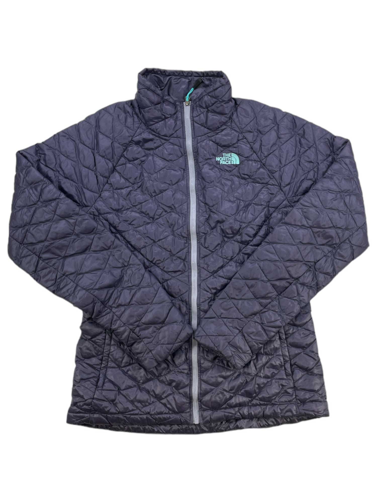 A black, quilted Women's ThermoBall Full-Zip Jacket by The North Face with a high collar, front zipper, and left chest logo is shown laid flat on a white background.