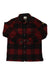 The Canada Shirt is a long-sleeve, button-up wool shirt in red and black plaid, with two chest pockets—ideal for casual travel.