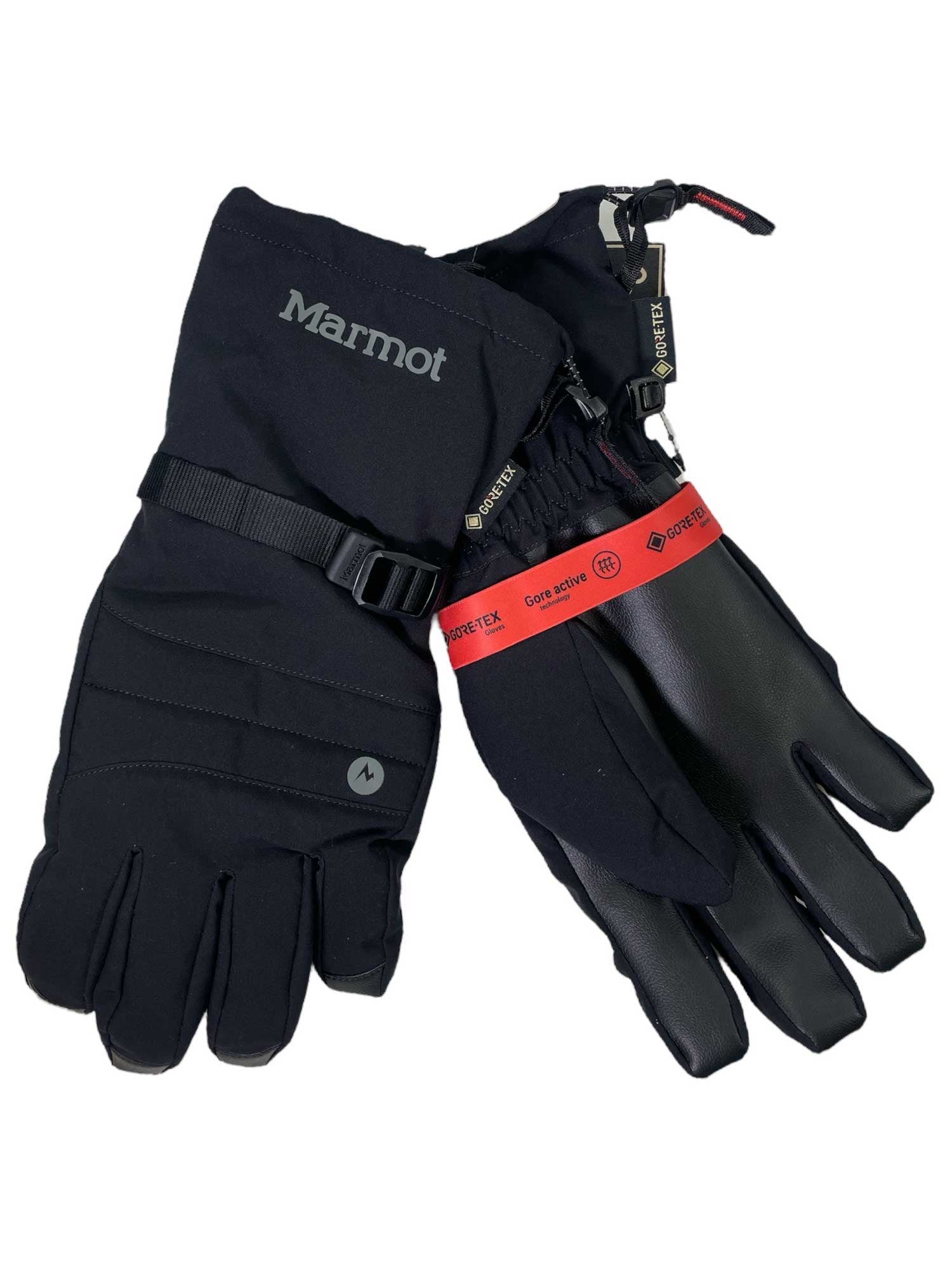 A pair of black Marmot Womens Snoasis Gloves featuring Gore-Tex tags, thermal insulation, adjustable wrist straps, and reinforced palms; one glove has the Marmot logo and the other a red Gore-Tex band near the wrist.