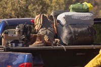 camping gear and accessories in the back of a truck