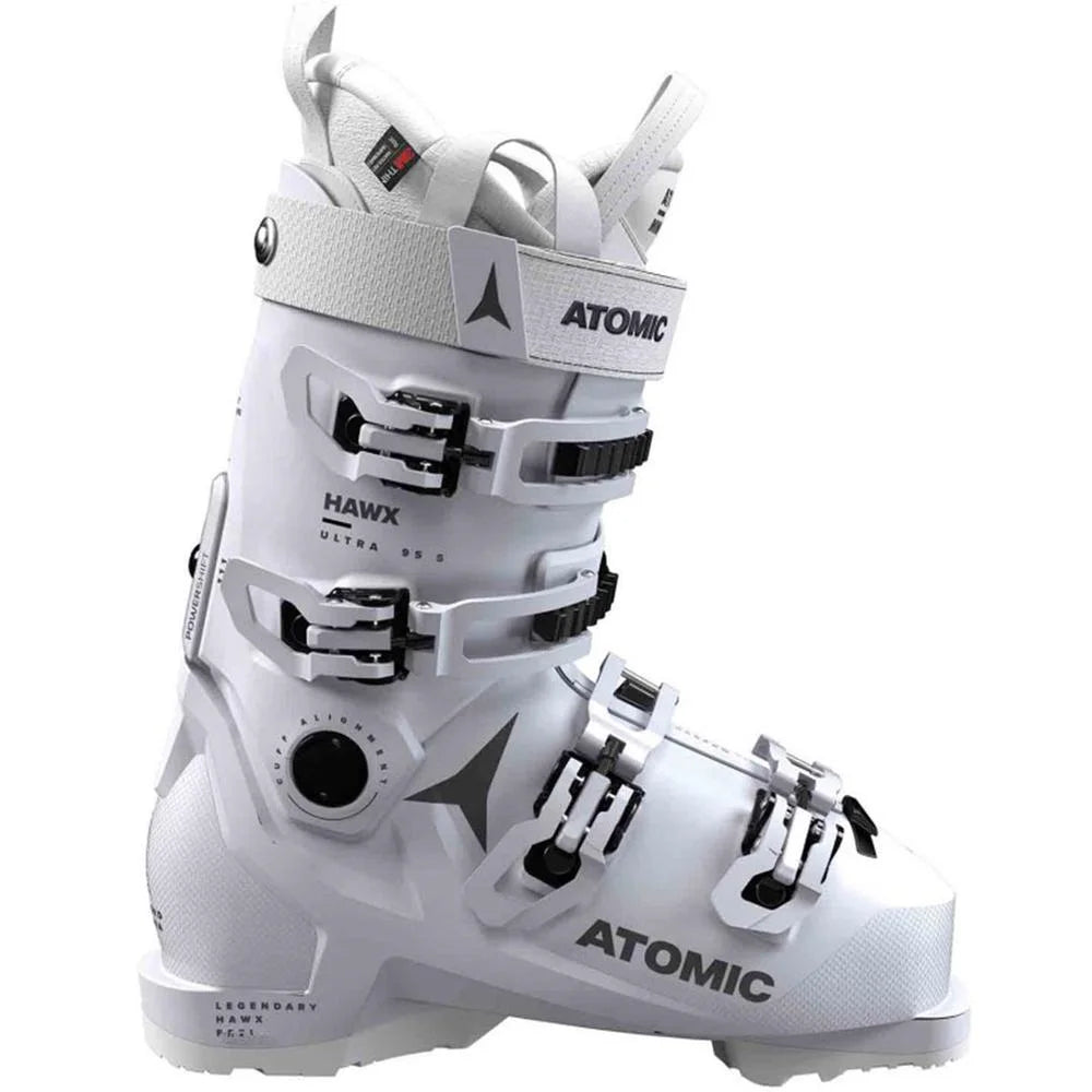 The Hawx Ultra 95 S W GW Ski Boots are white with black and silver buckles, a large ankle strap, and ATOMIC branding on the side; expertly crafted for downhill skiing.