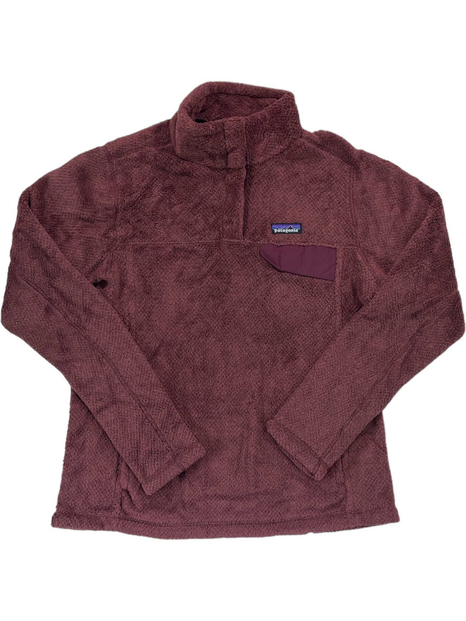 The Women's Re-Tool Snap-T Pullover is a maroon Polartec Thermal Pro fleece with long sleeves, a high collar, quarter-zip front, and a small left chest pocket featuring a contrasting maroon flap.