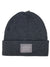 The Pistil Men's Morris Beanie is a dark gray recycled polyester beanie with a folded brim. A front patch features a minimalist mountain and “PISTIL” logo—ideal for hiking adventures.