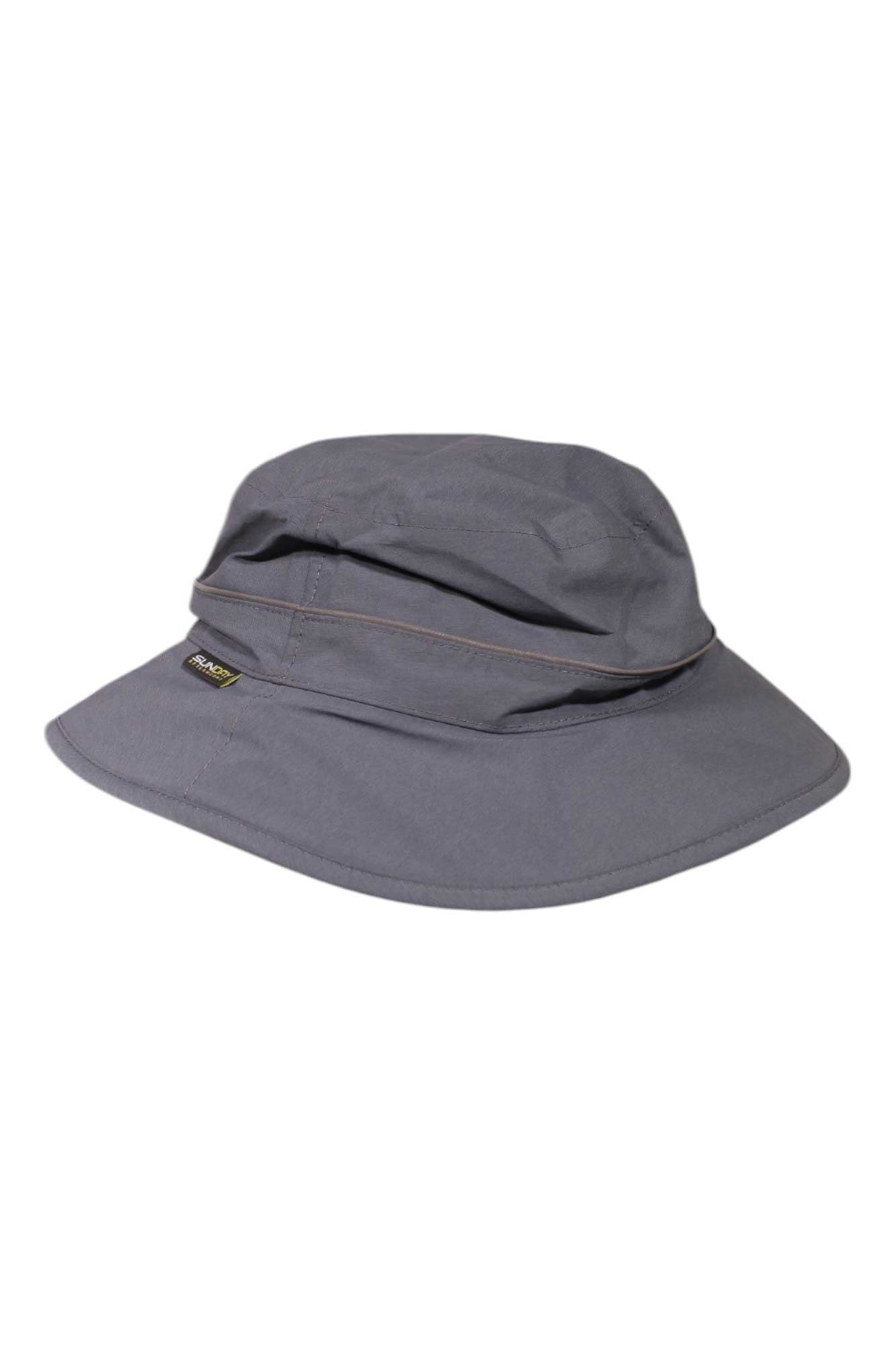 The Sunday Afternoons Ultra Storm Bucket Hat is a gray, wide-brimmed hiking hat featuring subtle seam details and a small black fabric tag on the side, providing style and comfort against a plain white background.