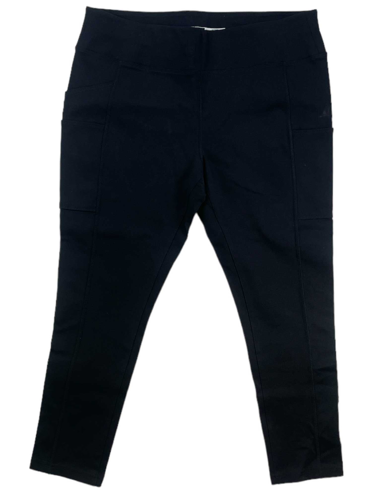 A pair of Womens Force Fitted Lightweight Utility Leggings in black, featuring a mid-rise fit, high waistband, visible side seams, and a sleek silhouette, shown laid flat on a white background.