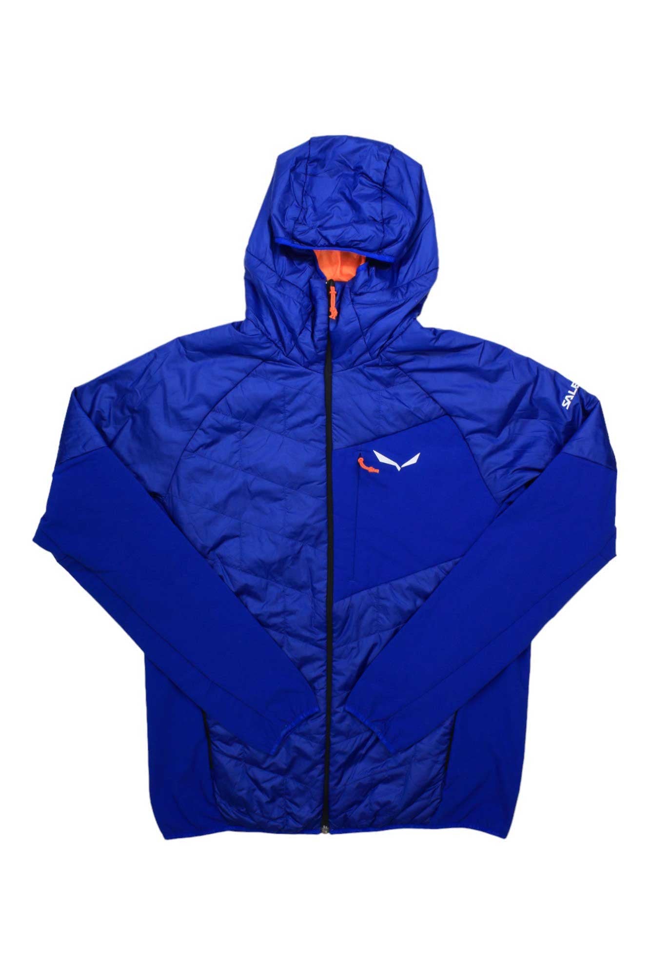 The Salewa Men's Ortles Hybrid TW CLT Jacket is blue with a front zipper, orange inner lining, insulated hood, long sleeves, white left chest logo, and is wind-resistant and lightweight for outdoor or athletic use.