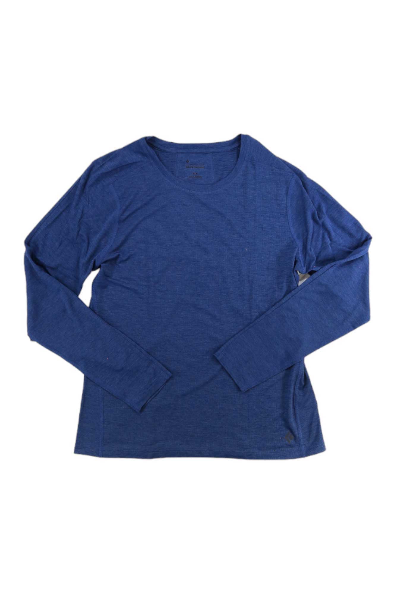 The Black Diamond Women’s Lightwire LS Tee is a solid dark blue, long sleeve crew neck laid flat on a white background—ideal as a quick-drying shirt for active days.