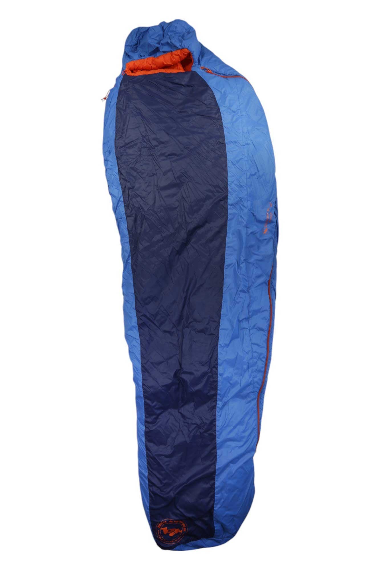 A blue and dark blue Dumont SL 30 Sleeping Bag with orange lining and zipper stands upright, fully zipped—ideal for outdoor trips with its warm synthetic insulation.