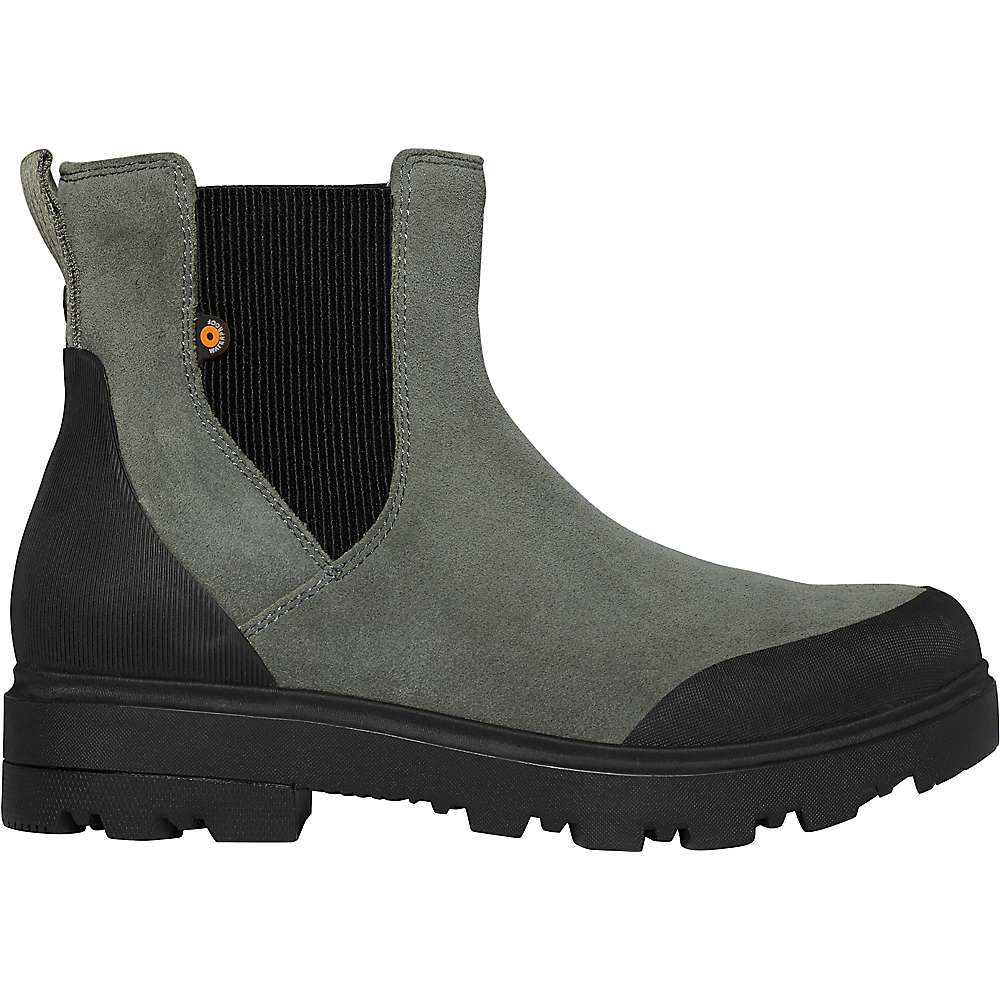 The Bogs Womens Holly Chelsea Leather Boot is a gray waterproof leather boot featuring black elastic side panels, heel pull tab, thick black rubber sole, and reinforced black detailing for durability and eco-friendly wear.