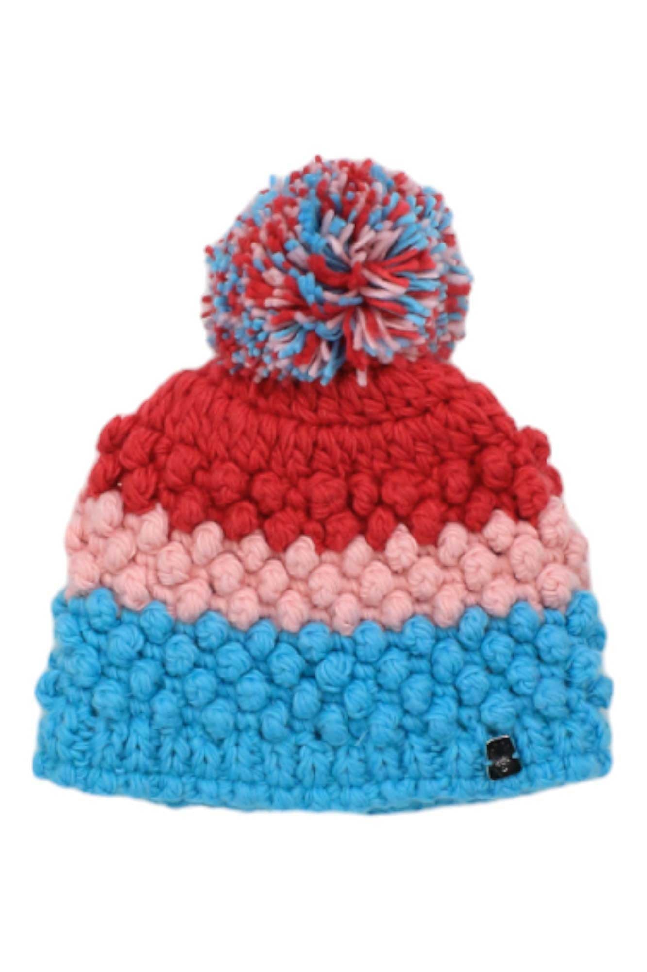 The Spyder Girls Bitsy Brrr Berry Hat is a cozy winter beanie featuring a large pom-pom, bold blue, pink, and red stripes, and a small black label by the brim—perfect for keeping warm in style on chilly days.