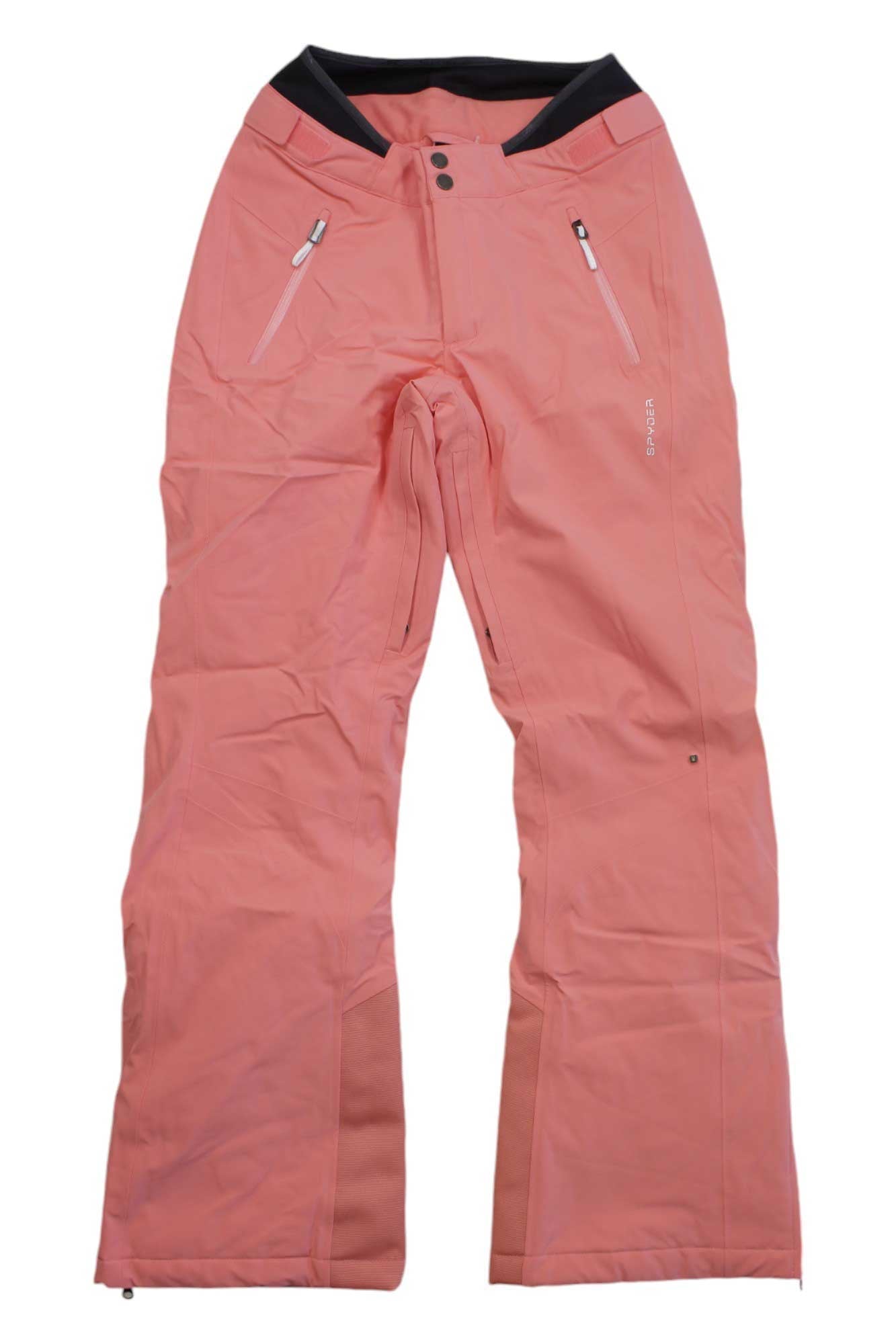 A pair of Spyder Womens Echo Pant snow pants in light pink, featuring zippered side pockets, a black waistband lining, and reinforced ankle fabric, shown laid flat against a white background.