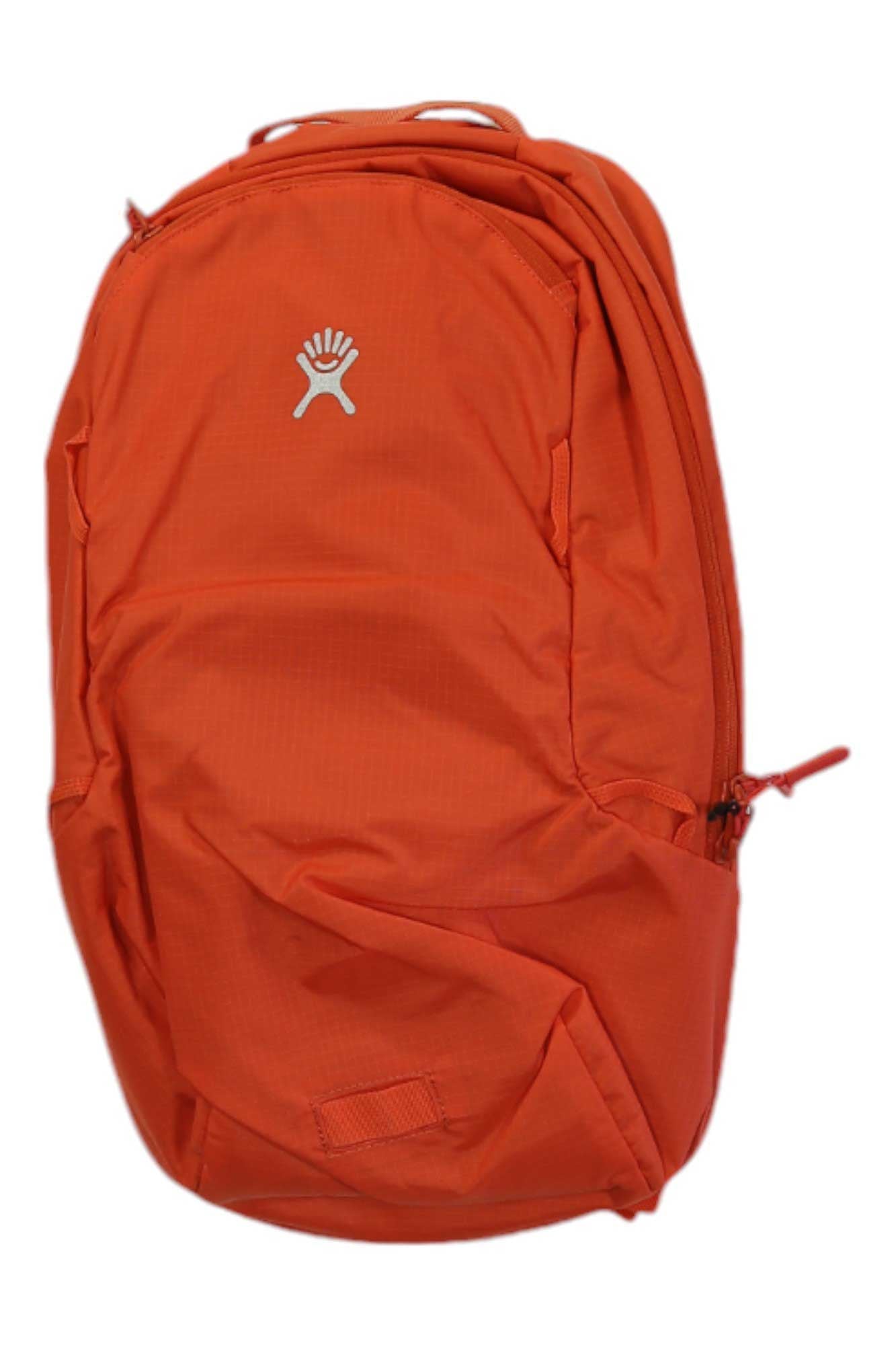 The Hydro Flask 14L Down Shift Hydration Pack is a bright orange backpack with a zipper pocket and white Hydro Flask logo, ideal for carrying bike essentials. It's shown against a plain white background.