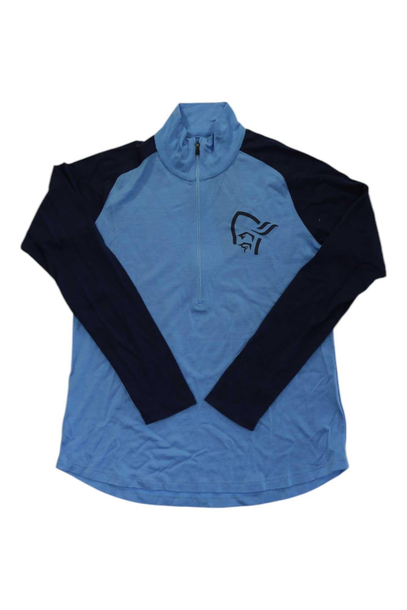 Women’s Pureull zip-neck top in light blue with dark sleeves, half-zip and chest logo