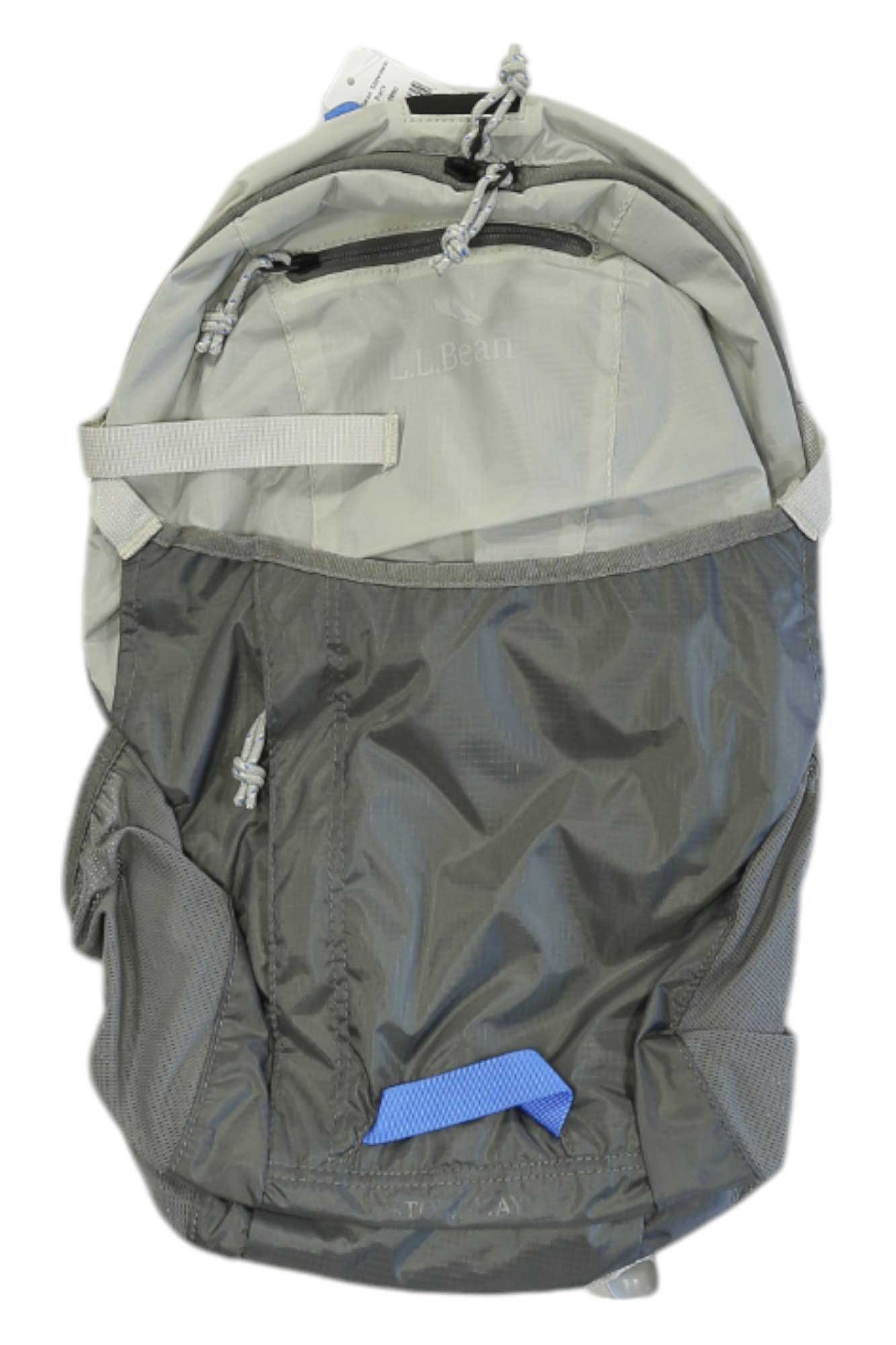 L.L.Bean stowaway pack in light gray with blue tag and gray webbing straps