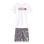 The North Face Toddlers Cotton Summer Set features a white short-sleeve tee with "Never Stop Exploring" and graphic on the chest, paired with blue shorts with a red and blue dinosaur print—perfect for playful summer days.