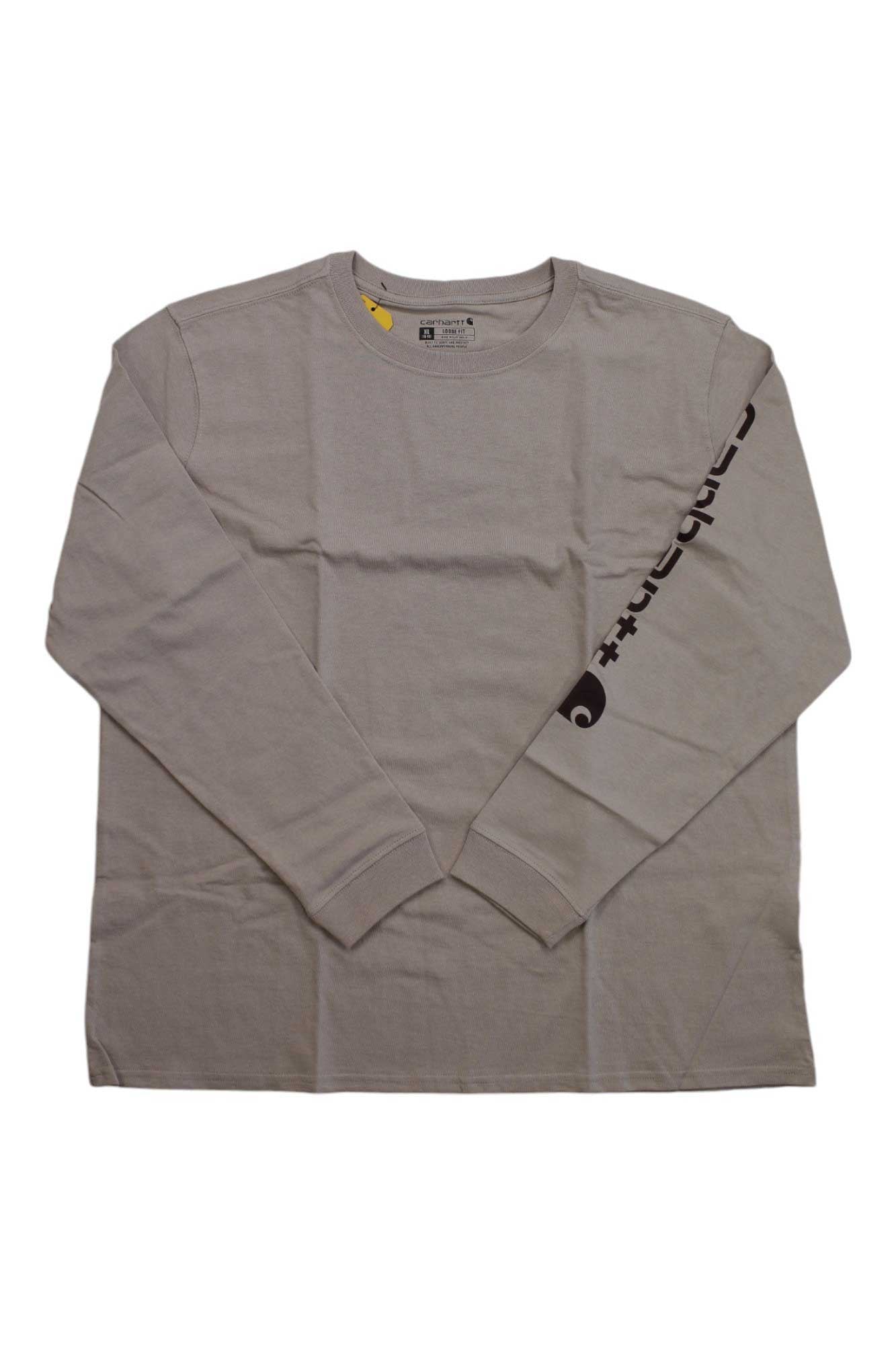 The Carhartt Women's Loose Fit Heavyweight Pocket LS T-Shirt is light gray with a round neck, long sleeves, and black graphics on the right sleeve. It has a pocket and is shown laid flat on a white background.