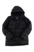 The Haglofs Womens Nas Down Jacket is black with a hood, front snap buttons, a small logo on the upper left sleeve, and made from recycled polyester for water-resistant protection. Displayed on a white background.