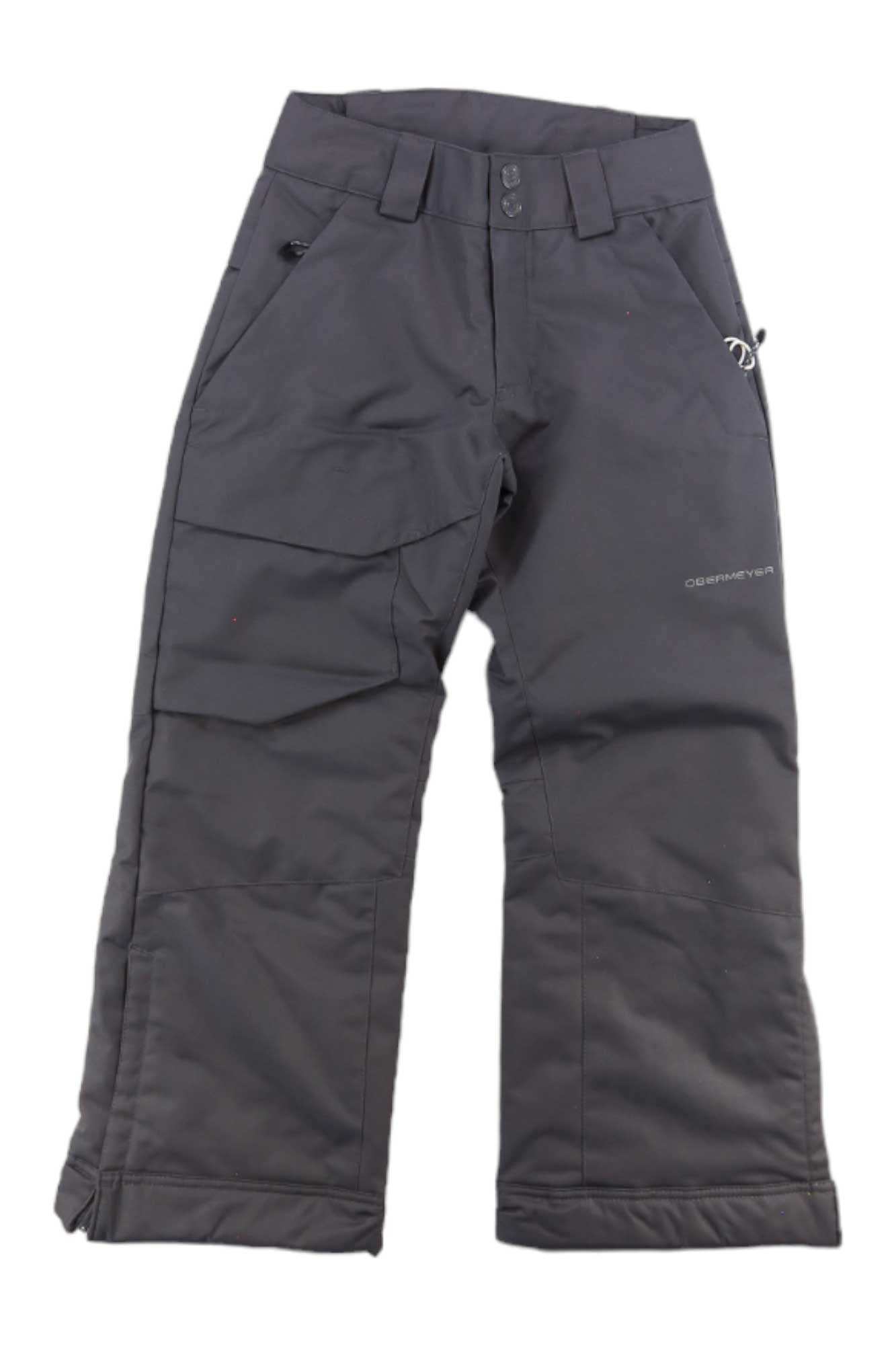 The Obermeyer Teen Boys Brisk Pant in dark gray features an adjustable waist, multiple pockets, reinforced knees, and waterproof fabric—ideal for outdoor winter activities. Pants are shown laid flat on a white background.